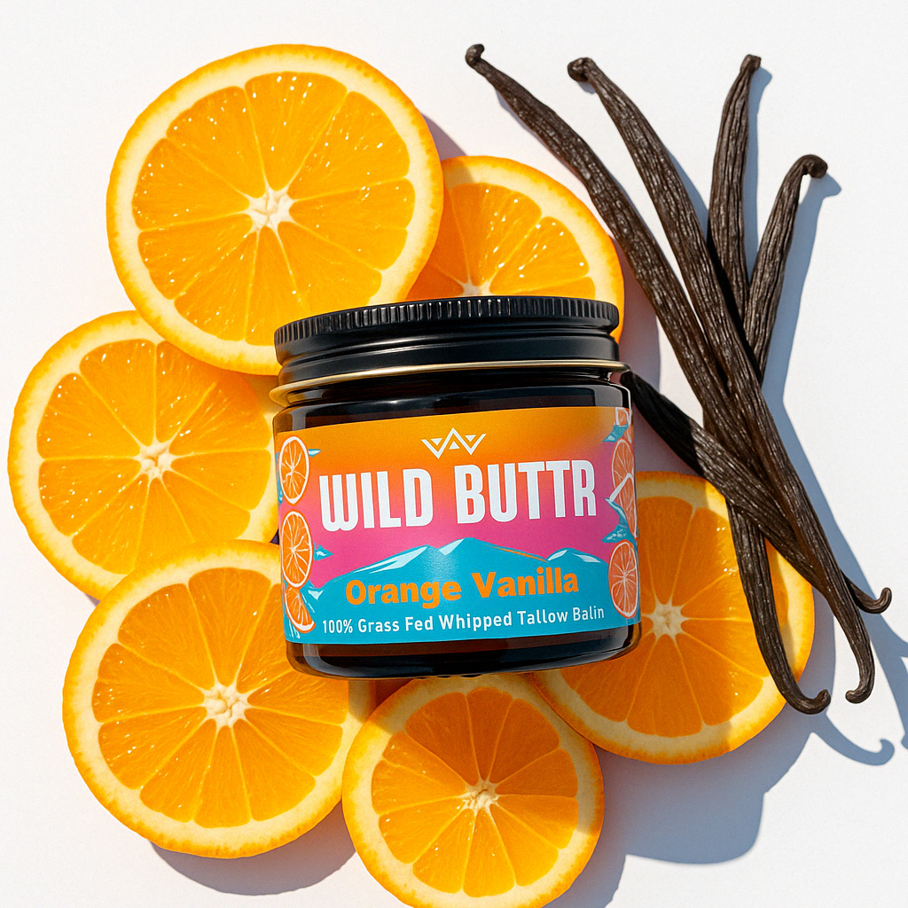 Wild Buttr Orange Vanilla grass-fed tallow body butter with sliced oranges and fresh vanilla beans for bright, natural scent and deep skin nourishment