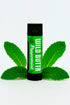 Wild Butter Peppermint Lip Balm with grass-fed tallow and organic ingredients, displayed with fresh peppermint leaves for natural lip hydration and protection