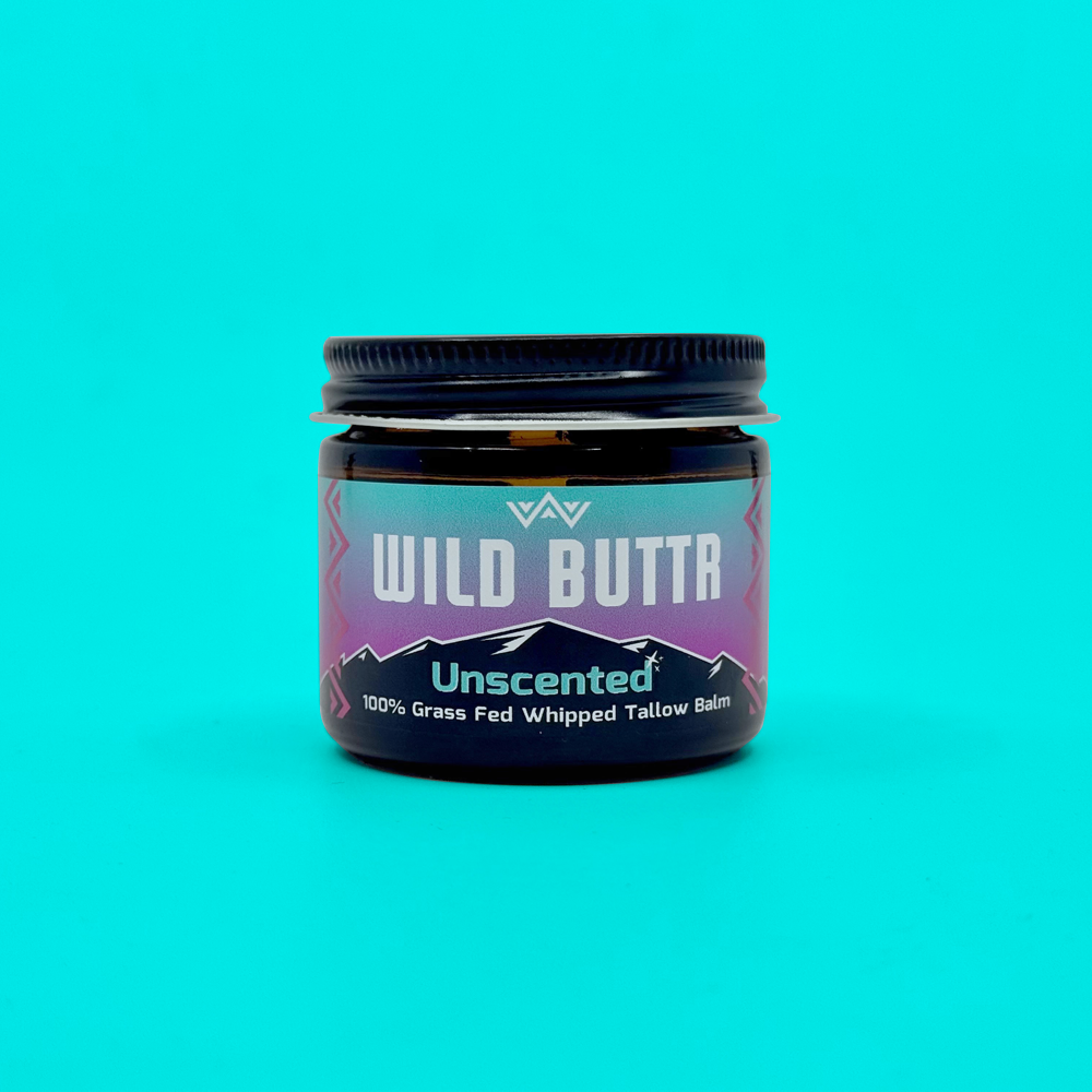 Wild Butter Unscented grass-fed tallow body butter on bright blue background with organic, fragrance-free ingredients for sensitive skin and hydration